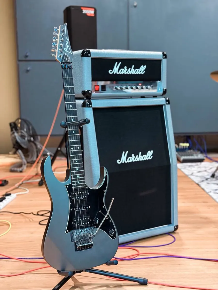 Marshall guitar amp and Ibanez guitar
